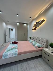 Ένα ή περισσότερα κρεβάτια σε δωμάτιο στο Light House apt near complex TSUM and GUM