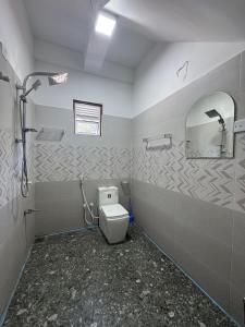 Koupelna v ubytování Aruna homestay