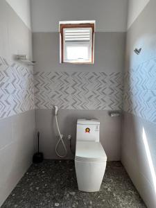 Koupelna v ubytování Aruna homestay