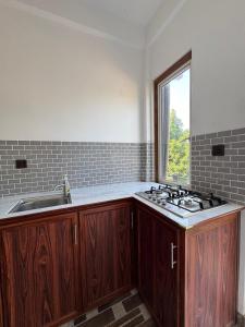 Kuchyň nebo kuchyňský kout v ubytování Aruna homestay
