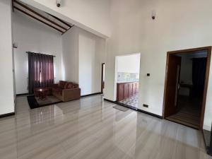 Posezení v ubytování Aruna homestay