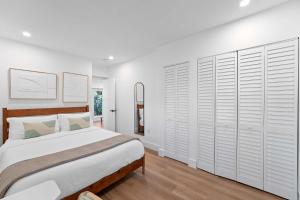 En eller flere senge i et værelse på 921 Apartment 3