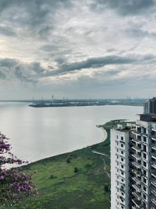 a view of a large body of water from a building at Forestcity40 in Gelang Patah