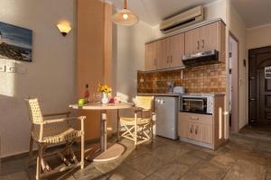 A kitchen or kitchenette at Agnanti Hotel Apartments