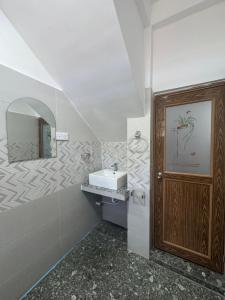Koupelna v ubytování Aruna homestay + 5 fotografií