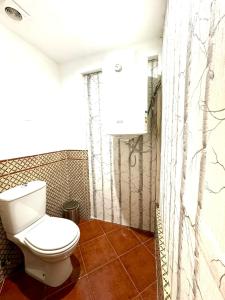 A bathroom at Apartamentos con jacuzzi ALQUILER TEMPORAL