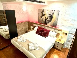 A bed or beds in a room at Apartamentos con jacuzzi ALQUILER TEMPORAL