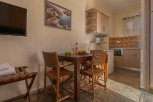 A kitchen or kitchenette at Agnanti Hotel Apartments