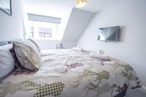 Postel nebo postele na pokoji v ubytování Cosy 1 bed in Rothes-Ideal for Whisky enthusiasts