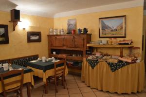 Nápoje v ubytování Hotel Petit Giles