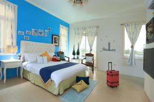 Katil atau katil-katil dalam bilik di Mandy's House B&B