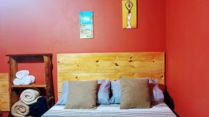 Cama ou camas em um quarto em Chalés Guigó-Cumuruxatiba, sossego e privacidade