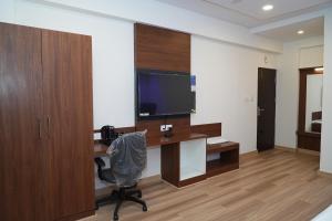 TV a/nebo společenská místnost v ubytování Hotel Grand Sigma