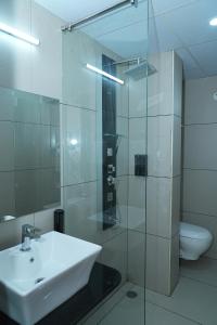 Koupelna v ubytování Hotel Grand Sigma