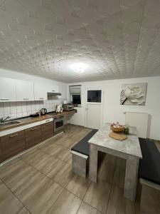 Kuchyň nebo kuchyňský kout v ubytování Waldr Apart Souterrain + 5 fotografií