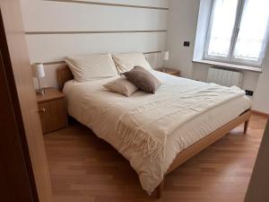 Postel nebo postele na pokoji v ubytování Le Tre A - Luna