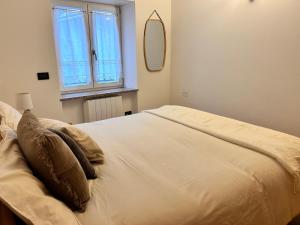 Postel nebo postele na pokoji v ubytování Le Tre A - Luna