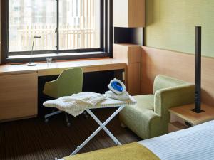 Postel nebo postele na pokoji v ubytování Mitsui Garden Hotel Kashiwa-No-Ha - Chiba