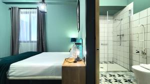 Bilik mandi di Hografic Hotel +97 gambar