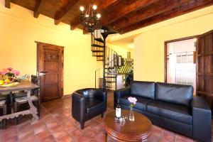 A seating area at Castle Tower apartment in rural holiday park 'Picasso'