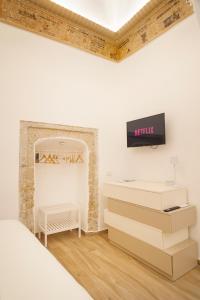 Μια τηλεόραση ή/και κέντρο ψυχαγωγίας στο Duomo Holiday