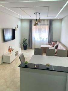 TV a/nebo společenská místnost v ubytování Mama cosy - Clim, Wifi, Piscine en centre ville