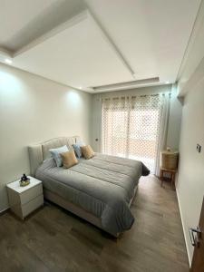 Postel nebo postele na pokoji v ubytování Mama cosy - Clim, Wifi, Piscine en centre ville + 6 fotografií