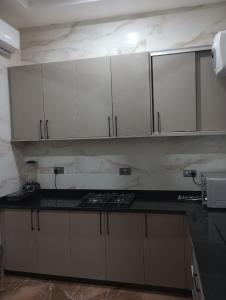 Køkken eller tekøkken på 3 Bedroom Apartment North Legon