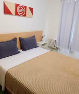 Postel nebo postele na pokoji v ubytování Flats Via Mar Slim