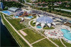 an aerial view of a water park with an amusement park at Harmony Residence in Oradea