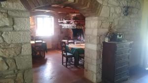 Un restaurante o sitio para comer en Guesthouse Pino