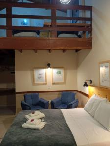 Cama ou camas em um quarto em Pousada dos Anjos