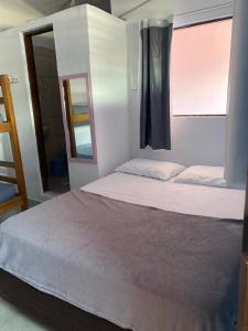 Postel nebo postele na pokoji v ubytování Hostel Rota 027 Itacaré