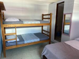Postel nebo postele na pokoji v ubytování Hostel Rota 027 Itacaré
