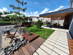 Zahrada ubytování Snowhouse rodinné apartmány s balkónom 100m2