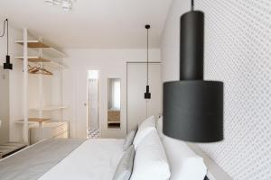 Letto o letti in una camera di B&B LUMAS