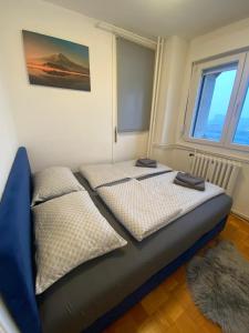 Ένα ή περισσότερα κρεβάτια σε δωμάτιο στο 3-rooms Arena apartment +9 φωτογραφίες