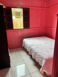 Katil atau katil-katil dalam bilik di Casa em Tramandaí