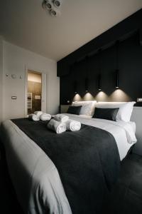 Letto o letti in una camera di B&B LUMAS