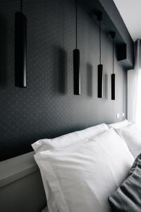 Letto o letti in una camera di B&B LUMAS