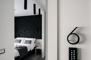 Letto o letti in una camera di B&B LUMAS