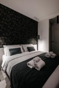 Letto o letti in una camera di B&B LUMAS