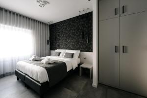Letto o letti in una camera di B&B LUMAS