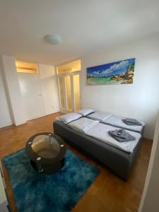 Ένα ή περισσότερα κρεβάτια σε δωμάτιο στο 3-rooms Arena apartment