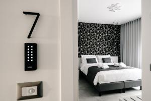 Letto o letti in una camera di B&B LUMAS