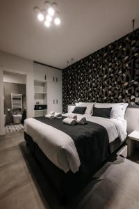 Letto o letti in una camera di B&B LUMAS
