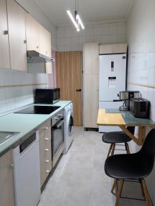 Кухня или мини-кухня в Alójate en Vigo! Casita bien equipada

