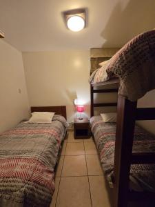 Postel nebo postele na pokoji v ubytování Amaru Peru Hotel