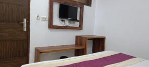 TV a/nebo společenská místnost v ubytování Hotel A10