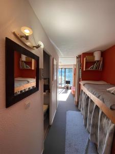 TV a/nebo společenská místnost v ubytování Le Saphir - Vue spectaculaire sur les Montagnes